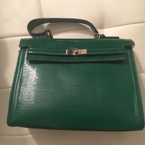 Green Satchel with turn lock closure